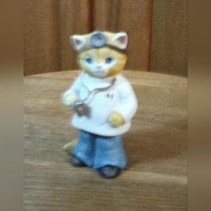 Vintage kitty cucumber doctor figurine